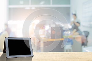 Businessmen blur in the workplace or work space of laptop on table in office room with computer or shallow depth of focus of