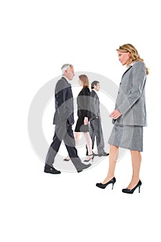 Businessmen and businesswomen walking