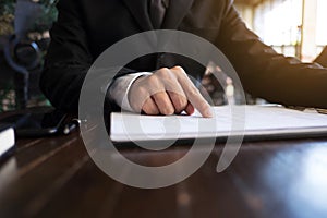 Businessmen calculate earnigs business performance, business concept photo