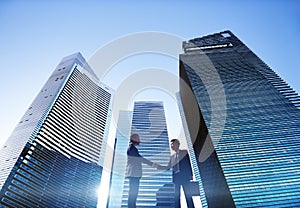 Businessmen Cityscape Handshake Partnership Concept