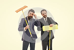 businessmen clear wall to white. clean slate. Partnership and teamwork. cleaning company. clean business. mature bearded