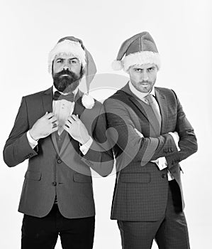 Businessmen with confident faces present team. Colleagues with beards get ready for Christmas. Christmas corporate party