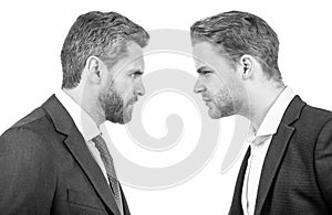 businessmen face to face. disagreed men partners. business competition. arguing businesspeople