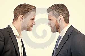businessmen face to face. disagreed men partners. business competition. arguing businesspeople