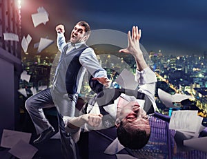 Businessmen fighting