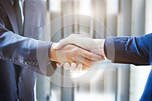 Businessmen handshake; success, dealing, greeting & business par