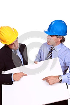 Businessmen with hardhats and blank cardboard