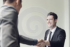 Businessmen making handshake agreement. concept partner to business