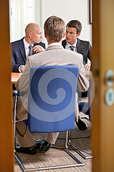 Businessmen in meeting at board room