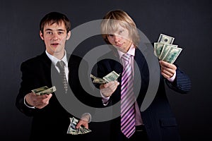 Businessmen and money.