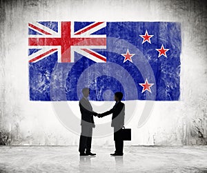Businessmen with New Zealander Flag
