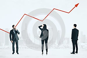 Businessmen with red chart arrow