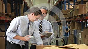 Businessmen With Scanner And Digital Tablet