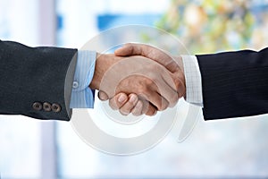 Businessmen shaking hand photo