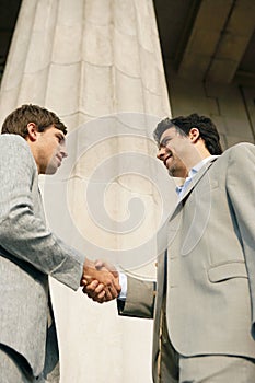 Businessmen shaking hands.