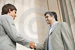 Businessmen shaking hands.