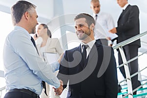 Businessmen shaking hands.