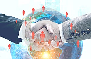 Businessmen shaking hands, city, global world