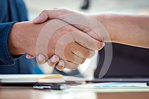 Businessmen shaking hands during a meeting. Handshake deal business corporate