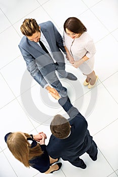 Businessmen shaking hands. Top View
