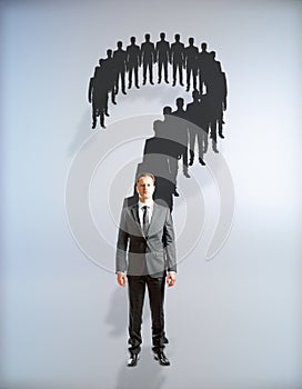 Businessmen silhouette question mark