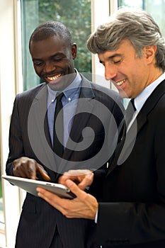 Businessmen with tablet