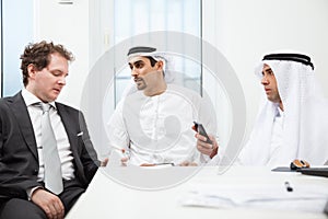 Businessmen talking on a meeting