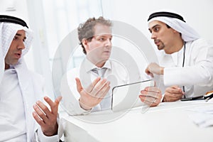 Businessmen talking on a meeting