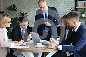 Businessmen teamwork brainstorming meeting to discuss plans of the investment