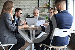 Businessmen teamwork brainstorming meeting to discuss plans of the investment