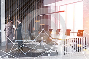 Businessmen in wooden office meeting room corner