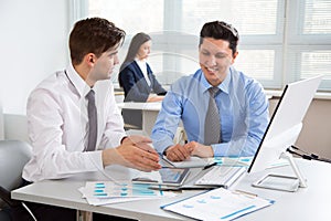 Businessmen working together in the modern office