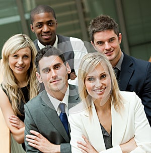 Businesspeople with a blond woman in the middle