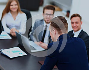Businesspeople at business meeting, seminar or conference.