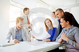 Businesspeople collaborating in office