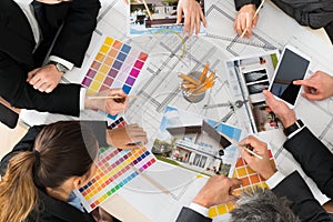 Businesspeople with color samples