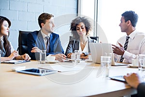 Businesspeople in conference room during meeting