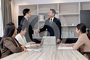 Businesspeople discussing at conference office desk, manager leader shaking hands at group board meeting. businessman reached