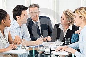 Businesspeople Discussing In Meeting