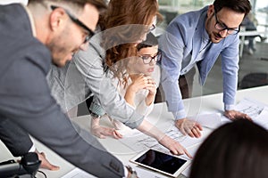 Businesspeople discussing together in conference room during meeting