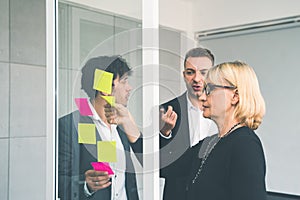 Businesspeople discussing together in conference room during meeting at office