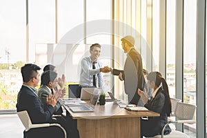 Businesspeople discussing together in conference room during meeting at office