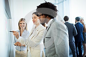 Businesspeople discussing together in conference room during meeting at office