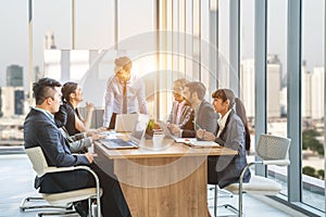 Businesspeople discussing together in conference room during meeting at office