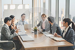 Businesspeople discussing together in conference room during meeting at office