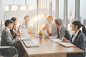 Businesspeople discussing together in conference room during meeting at office