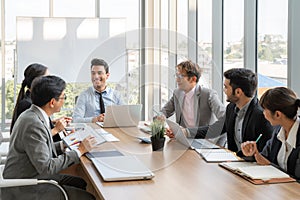 Businesspeople discussing together in conference room during meeting at office