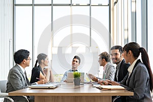 Businesspeople discussing together in conference room during meeting at office