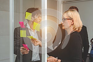 Businesspeople discussing together in conference room during meeting at office