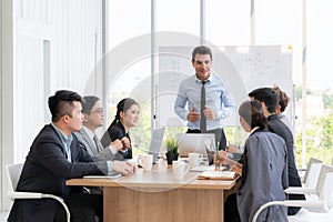 Businesspeople discussing together in conference room during meeting at office